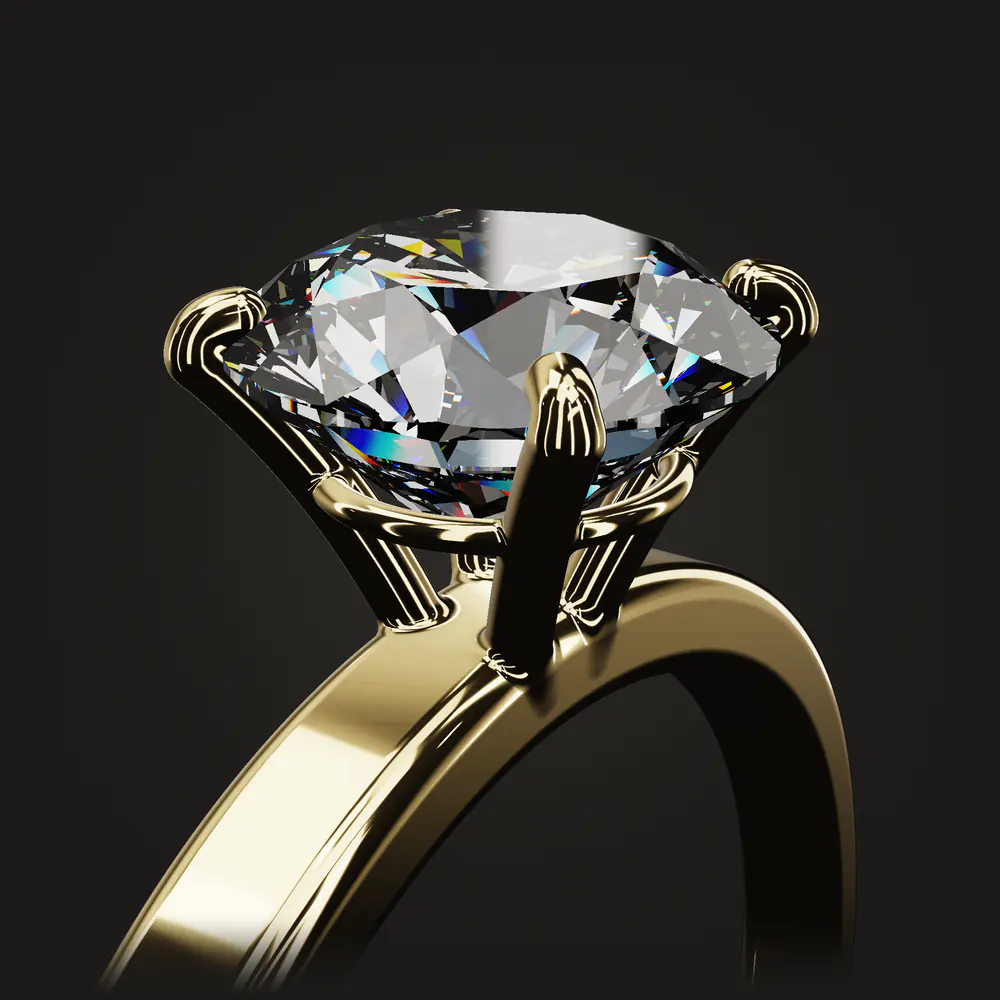 Four polished claws closing over the edge of the diamond as it settles into its setting.